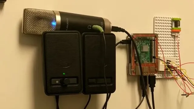 The setup for my college-era personal dorm room assistant, BrYOUno, with a Raspberry Pi, Arduino Uno, and servo motor controlling a lightswitch.